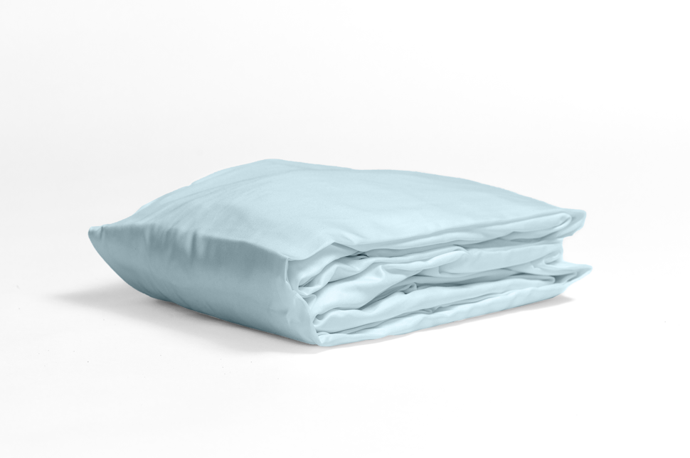 Folded fitted sheet in tranquil sky