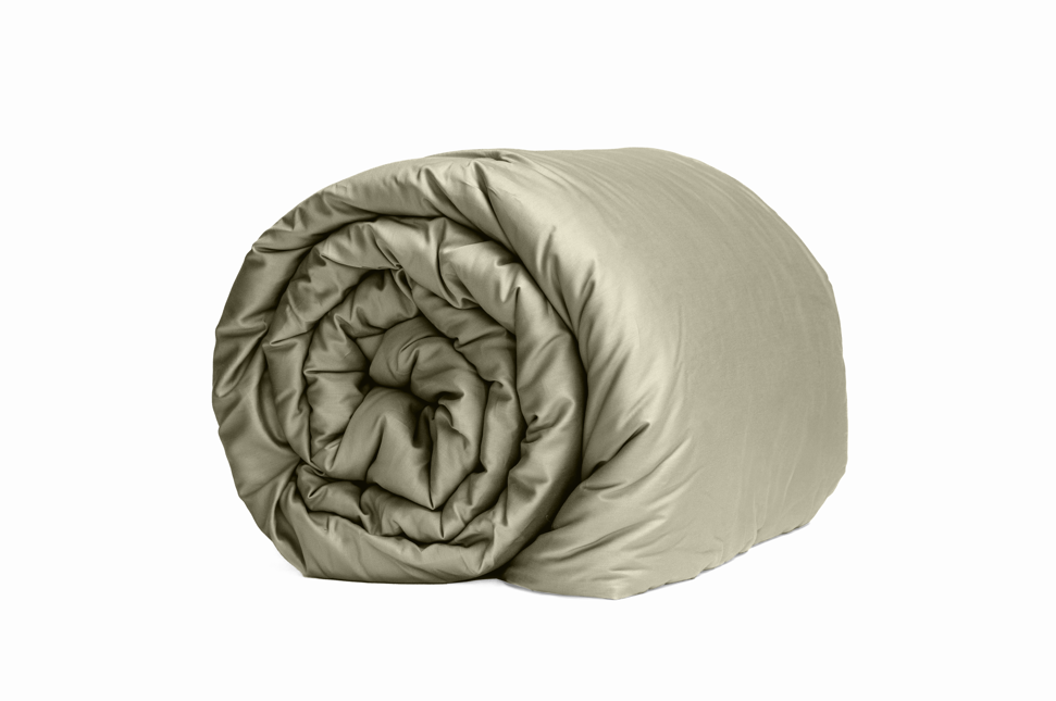 Rolled comforter in cozy oatmeal