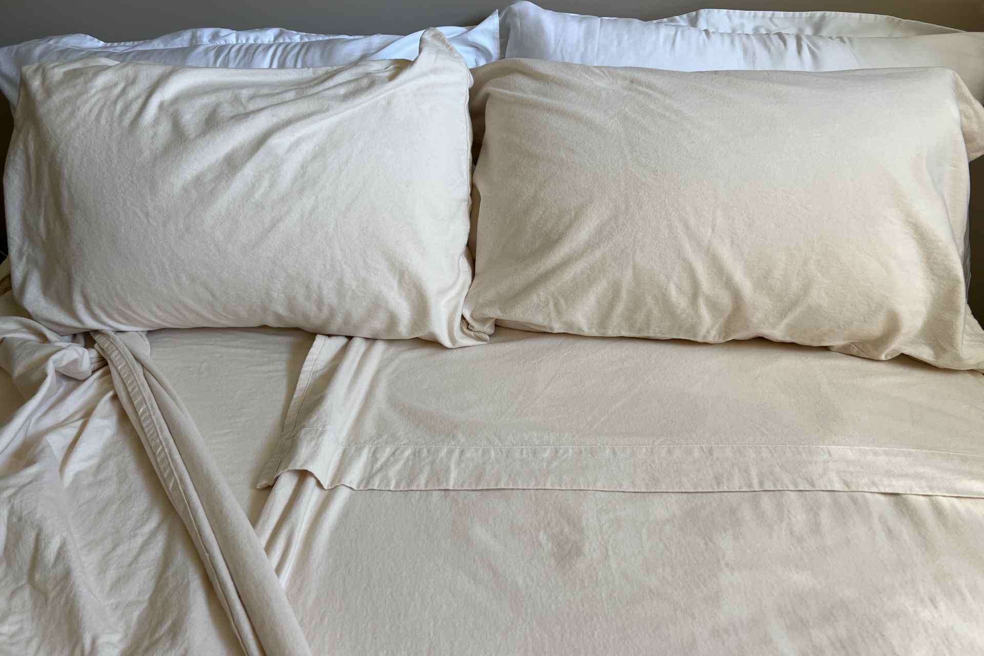 Flannel split sheet set and pillows on a bed