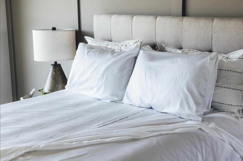 Percale flat sheet on bed