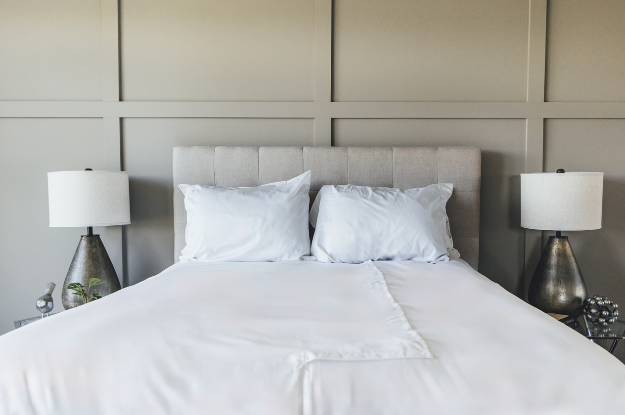 Sheet set on made bed