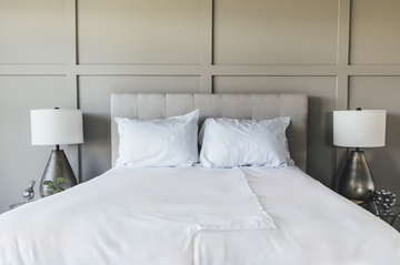 Sheet set on made bed