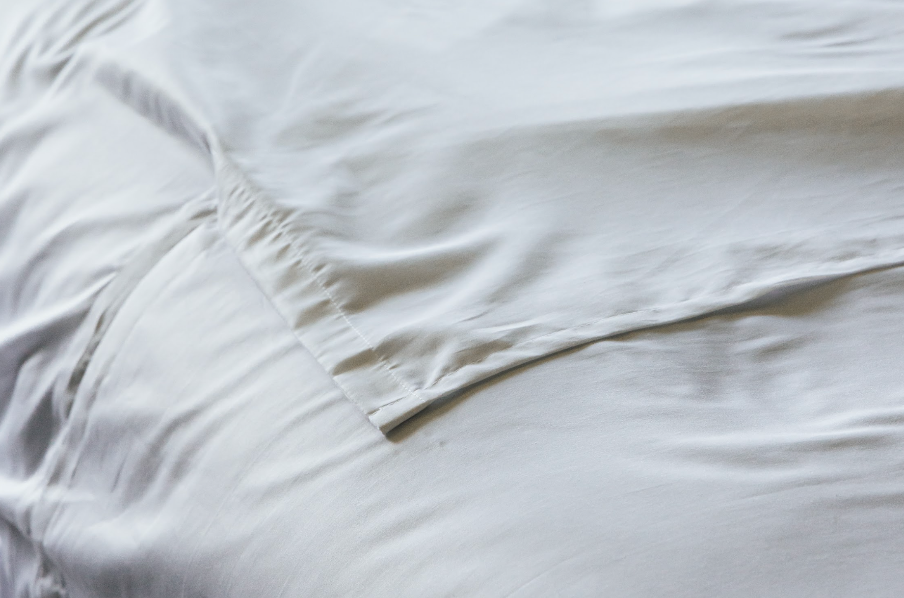 Percale flat sheet on bed