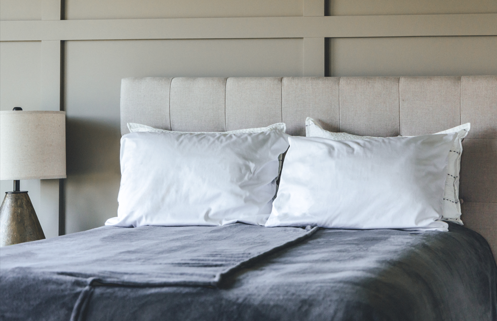 Bed showcasing split blanket