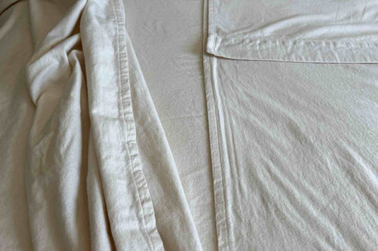 Close-up of flannel split sheet with visible texture and folds.